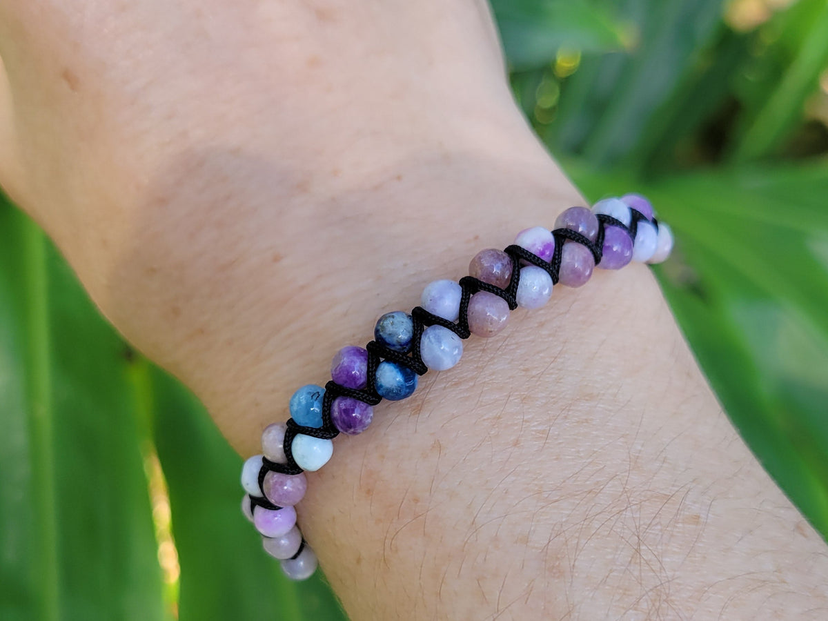 A beaded woven bracelet with gemstones
